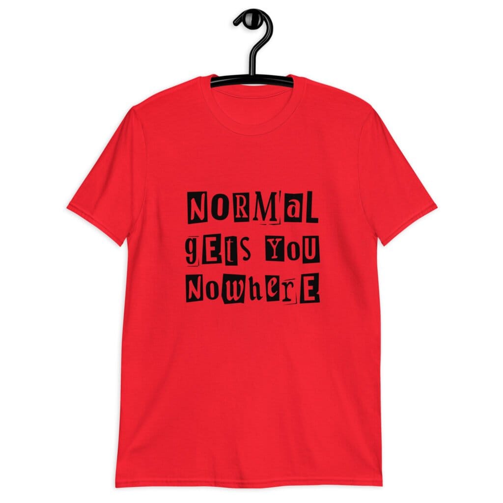Red t-shirt with the phrase 'Normal gets you nowhere' printed on the front.
