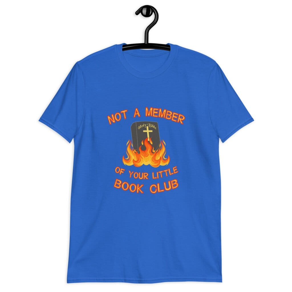 Royal blue t-shirt with image of a burning bible and the text 'Not a member of your little book club' printed on the front.