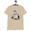 Sand color t-shirt with graphic of a retro man holding sign that says 'Ladies, mansplaining is short for man explaining' printed on the front.