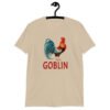 Sand color t-shirt with an image of a rooster and the word 'Goblin' printed under the rooster. The graphics are printed on the front of the shirt.