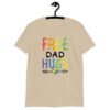 Sand color t-shirt with the text 'Free Dad hugs' printed on the front in rainbow letters.