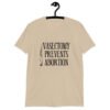 Sand color t-shirt that has an image of a surgical scalpel and the phrase 'Vasectomy prevents abortion' printed on the front.