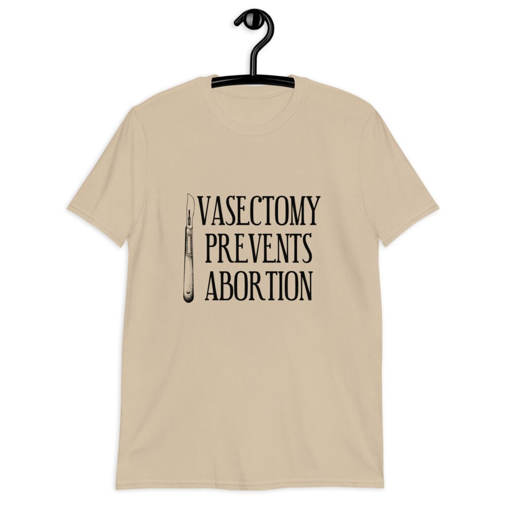 Sand color t-shirt that has an image of a surgical scalpel and the phrase 'Vasectomy prevents abortion' printed on the front.