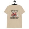 Sand color t-shirt with a circus theme graphic and the text 'Ringmaster of the Shitshow' printed on the front.