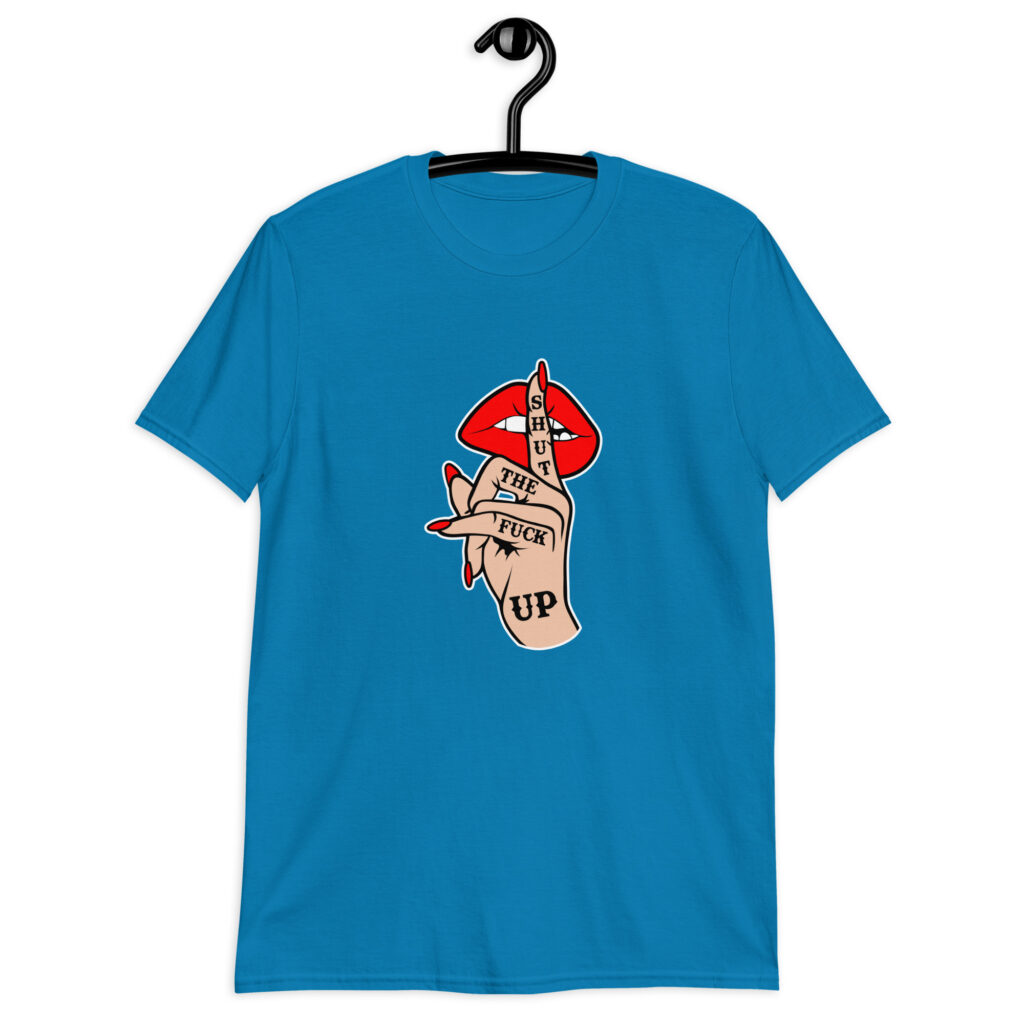 Sapphire blue t-shirt with an image of a hand over lips making the shh gesture. The words 'Shut the fuck up' are printed on the hand. The graphics are printed on the front.