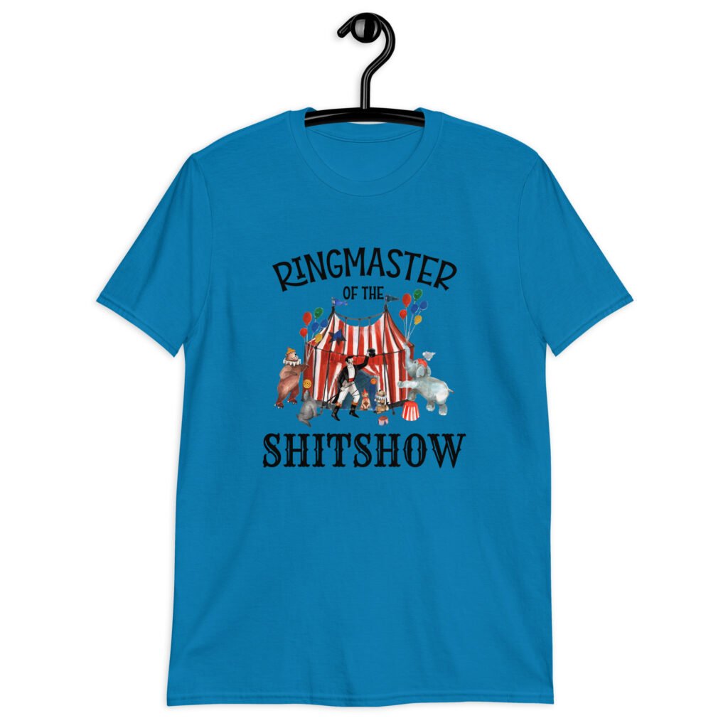 Sapphire blue t-shirt with a circus theme graphic and the text 'Ringmaster of the Shitshow' printed on the front.