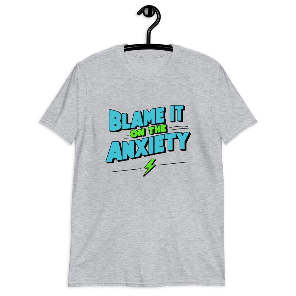 Sport grey t-shirt with the phrase 'Blame is on the anxiety' printed on the front. The graphics are bold and in aqua and lime green.