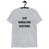 Sport grey t-shirt with the text 'Stop normalizing everything' printed on the front.