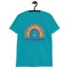Tropical blue t-shirt with an image of a boho style rainbow. There is an upside down cross in the center arch of the rainbow and the text 'Love like Lucifer' printed under. The graphics are printed on the front.