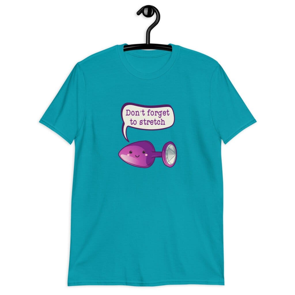Tropical blue t-shirt that has image of a purple anal plug with a smile face. There is a speech bubble above with the words 'Don't forget to stretch'. The graphics are printed on the front of the shirt.