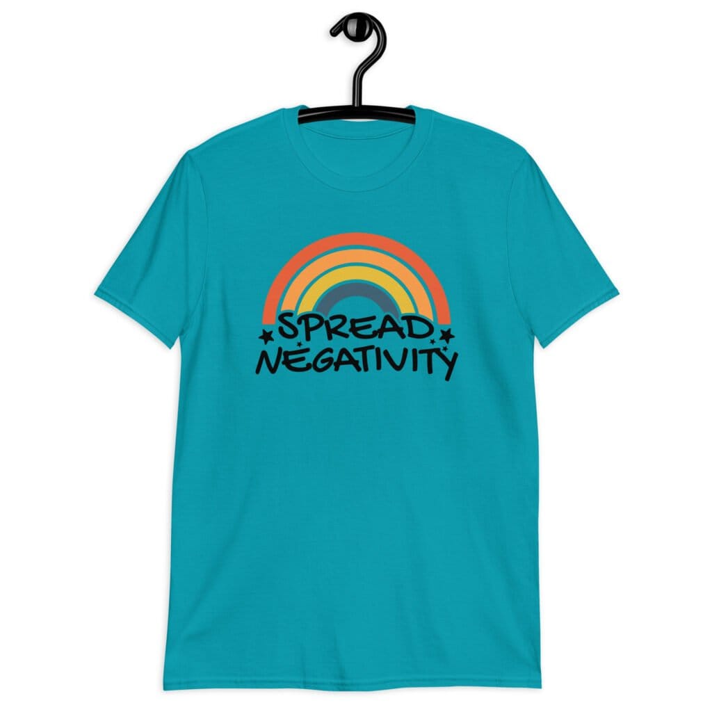 Tropical blue t-shirt with a graphic of a rainbow and the words 'Spread negativity' printed on the front.