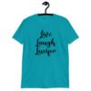 Tropical blue t-shirt with the parody phrase 'Live, Laugh, Lucifer' printed on the front.
