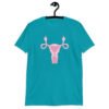 Tropical blue t-shirt with image of a pink uterus flipping middle finger graphic printed on the front.