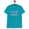 Tropical blue t-shirt with the text 'Eve was framed' printed on the front in pink.
