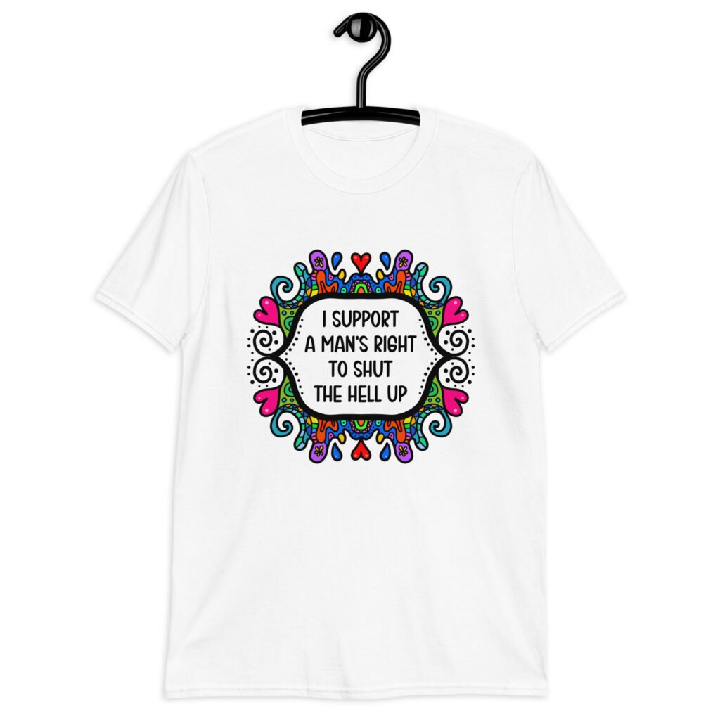 White t-shirt with a colorful doodle graphic and the words 'I support a man's right to shut the hell up.' The design is printed on the front.