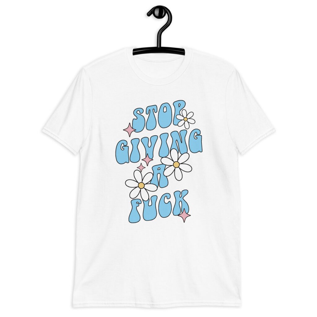 White t-shirt with a retro daisy and star design and the text 'Stop giving a fuck' printed on the front.