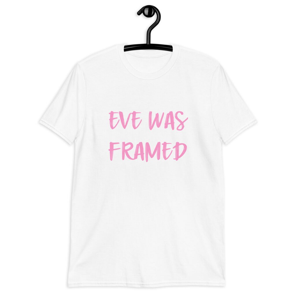 White t-shirt with the text 'Eve was framed' printed on the front in pink.