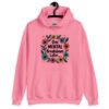 Azalea pink hoodie sweatshirt with a multi color floral wreath design printed on the front. The words 'One mental breakdown later...' are printed in the center of the wreath.