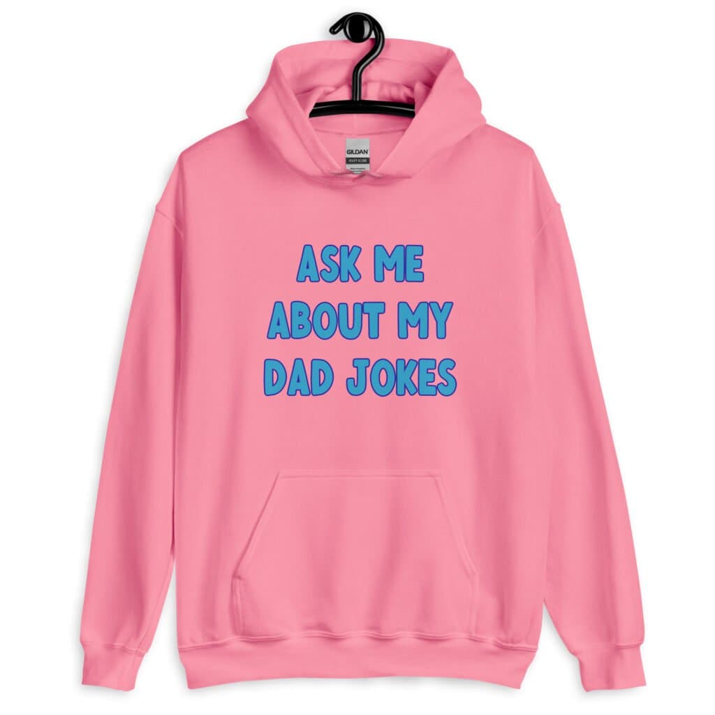 Azalea pink hoodie sweatshirt with the text 'Ask me about my Dad jokes' printed on the front.