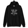 Black hoodie sweatshirt with the text 'Ask me about my tiny penis' printed on the front. The word tiny is much smaller than the rest of the text.