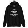 Black hoodie sweatshirt with the phrase 'Stop wondering if you're good enough. You're not.' printed on the front. The words 'You're not' are smaller then the rest.