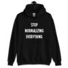 Black hoodie sweatshirt with the text 'Stop normalizing everything' printed on the front.