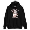 Black hoodie sweatshirt that says 'I think about murder' with image of cute fluffy kitten sitting in a teacup printed on the front.