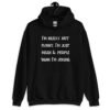 Black hoodie sweatshirt with the text 'I'm really not funny. I'm just mean & people think I'm joking' printed on the front.
