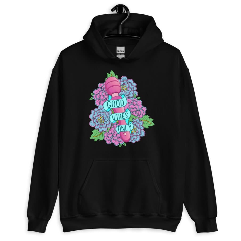 Black hoodie sweatshirt with graphic design that has the words 'Good vibes only' layered over a pink wand vibrator with flowers around. The graphic design is printed on the front of the hoodie.