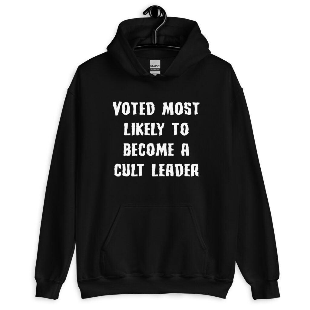 Black hoodie sweatshirt with the text 'Voted most likely to become a cult leader' printed on the front.