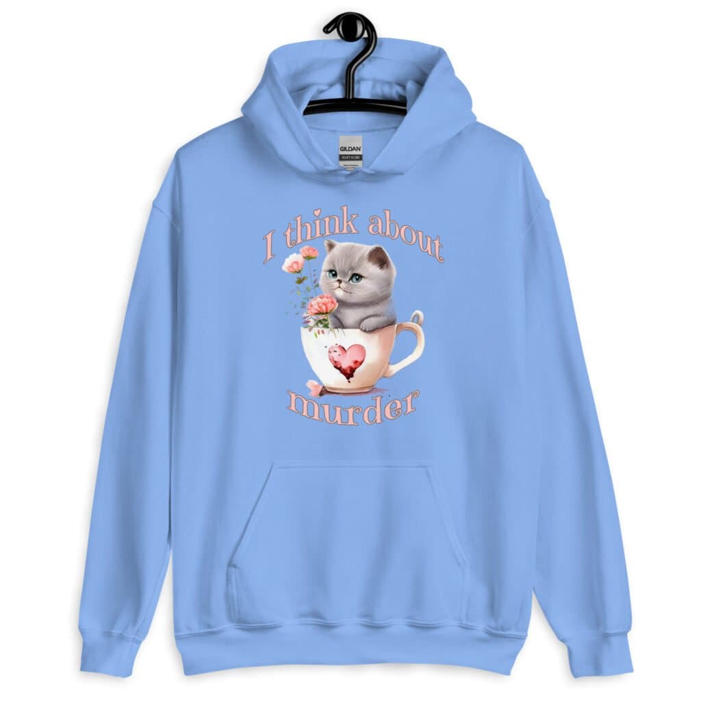 Carolina blue hoodie sweatshirt that says 'I think about murder' with image of cute fluffy kitten sitting in a teacup printed on the front.
