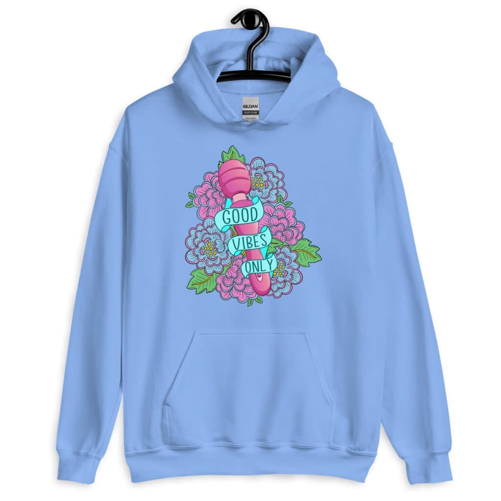 Carolina blue hoodie sweatshirt with graphic design that has the words 'Good vibes only' layered over a pink wand vibrator with flowers around. The graphic design is printed on the front of the hoodie.