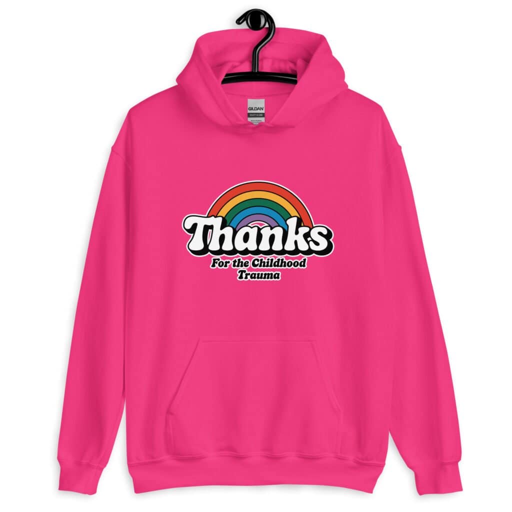 Heliconia pink hoodie sweatshirt with an image of a rainbow and the words 'Thanks for the childhood trauma' printed on the front. The word Thanks is large and the rest of the words are smaller under.