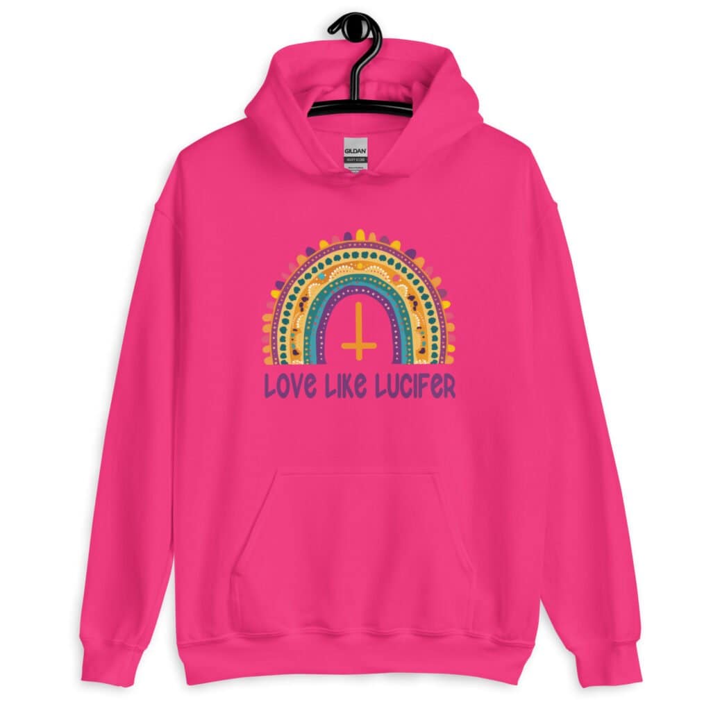 Heliconia pink hoodie sweatshirt with an image of a boho style rainbow. There is an upside down cross in the center arch of the rainbow and the text 'Love like Lucifer' printed under. The graphics are printed on the front.