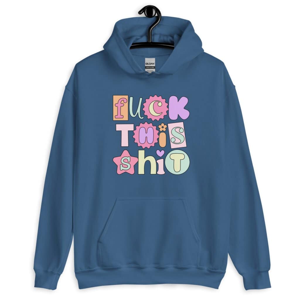 Indigo blue hoodie sweatshirt with colorful pastel font 'Fuck this shit' graphics printed on the front.