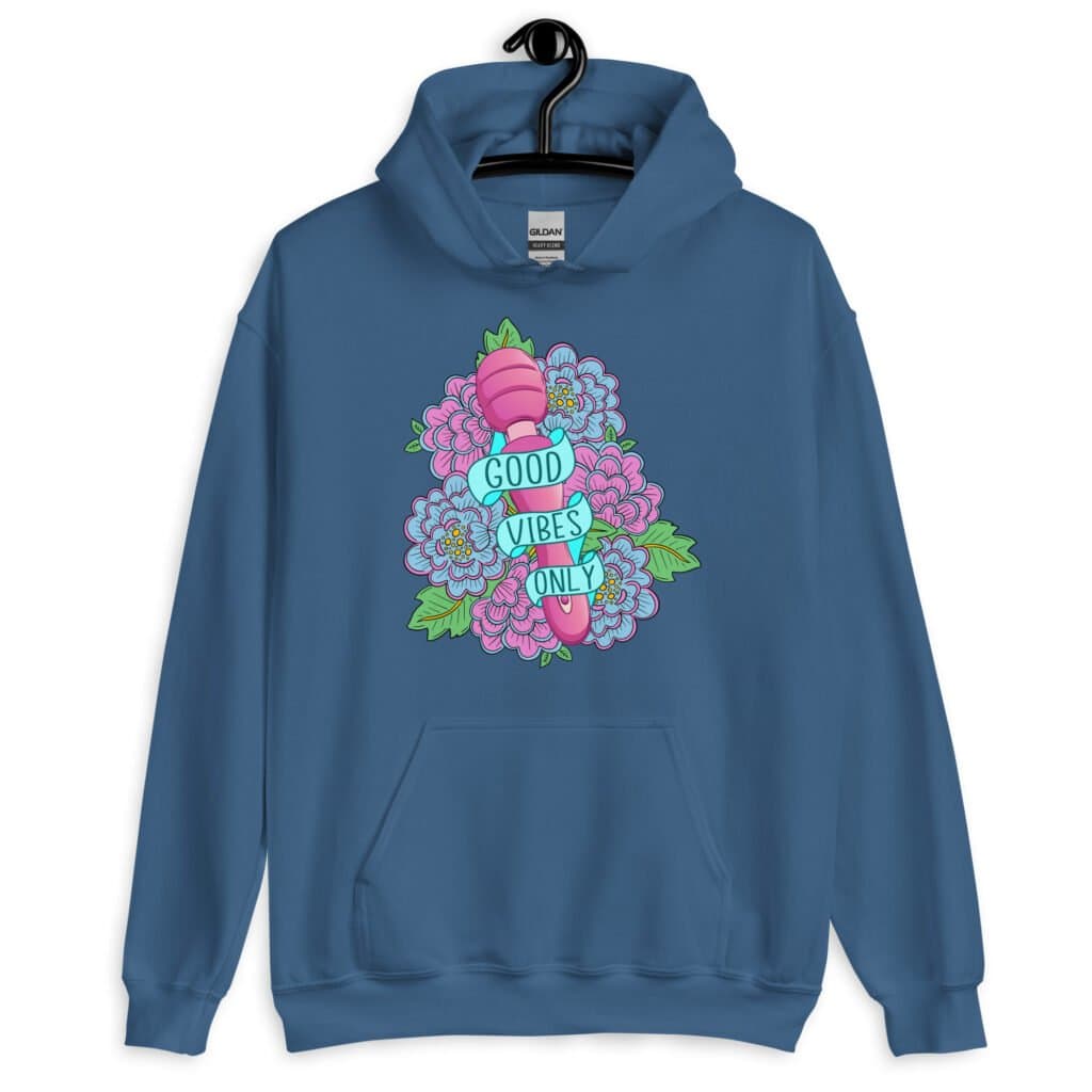 Indigo blue hoodie sweatshirt with graphic design that has the words 'Good vibes only' layered over a pink wand vibrator with flowers around. The graphic design is printed on the front of the hoodie.