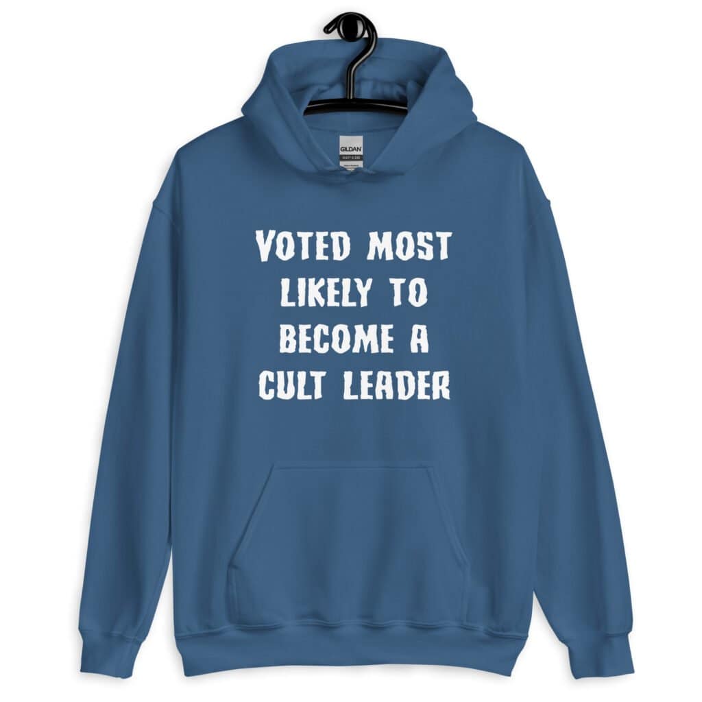 Indigo blue hoodie sweatshirt with the text 'Voted most likely to become a cult leader' printed on the front.