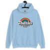 Light blue hoodie sweatshirt with an image of a rainbow and the words 'Thanks for the childhood trauma' printed on the front. The word Thanks is large and the rest of the words are smaller under.