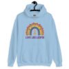 Light blue hoodie sweatshirt with an image of a boho style rainbow. There is an upside down cross in the center arch of the rainbow and the text 'Love like Lucifer' printed under. The graphics are printed on the front.