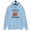 Light blue hoodie sweatshirt with a circus theme graphic and the text 'Ringmaster of the Shitshow' printed on the front.