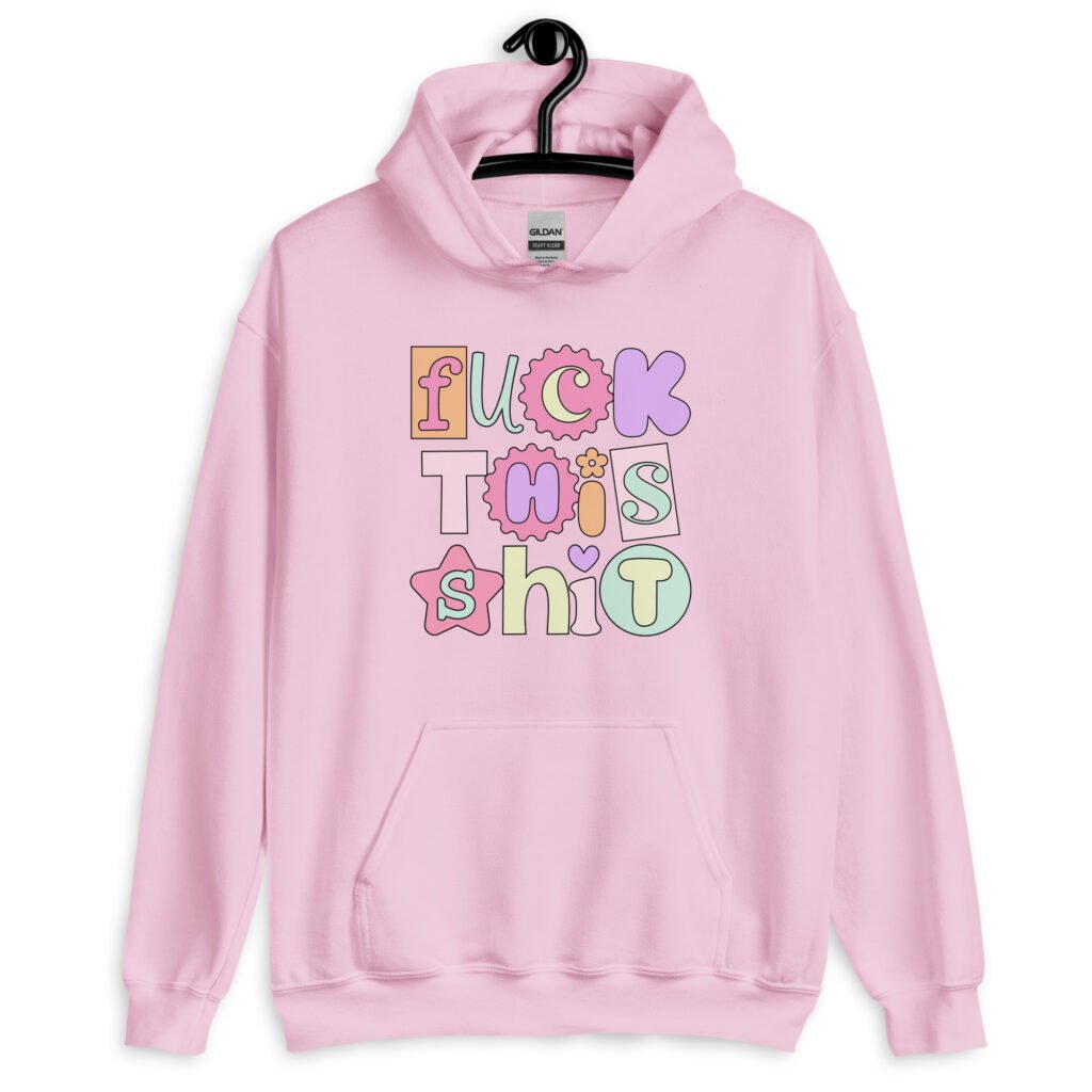 Light pink hoodie sweatshirt with colorful pastel font 'Fuck this shit' graphics printed on the front.