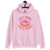 Light pink hoodie sweatshirt with an image of a donut with pink icing and sprinkles and the text 'Eat more hole foods' printed on the front.