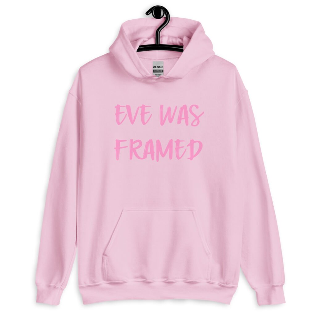 Light pink hoodie sweatshirt with the text 'Eve was framed' printed on the front in pink.