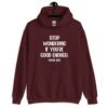 Maroon hoodie sweatshirt with the phrase 'Stop wondering if you're good enough. You're not.' printed on the front. The words 'You're not' are smaller then the rest.