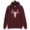 Maroon hoodie sweatshirt with image of a pink uterus flipping middle finger graphic printed on the front.