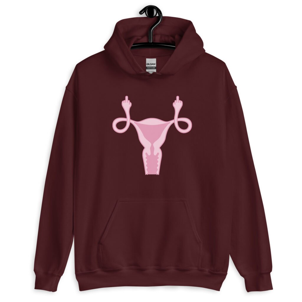 Maroon hoodie sweatshirt with image of a pink uterus flipping middle finger graphic printed on the front.