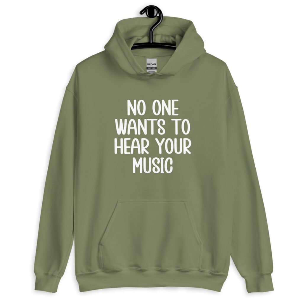 Military green hoodie sweatshirt with the text 'No one wants to hear your music' printed on the front.