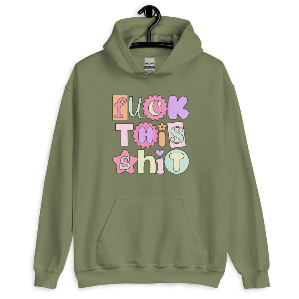 Military green hoodie sweatshirt with colorful pastel font 'Fuck this shit' graphics printed on the front.