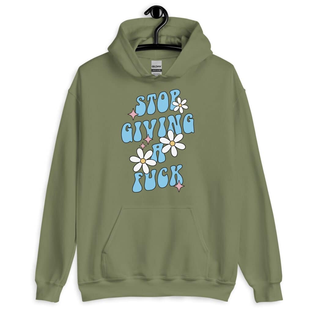 Militar green hoodie sweatshirt with a retro daisy and star design and the text 'Stop giving a fuck' printed on the front.