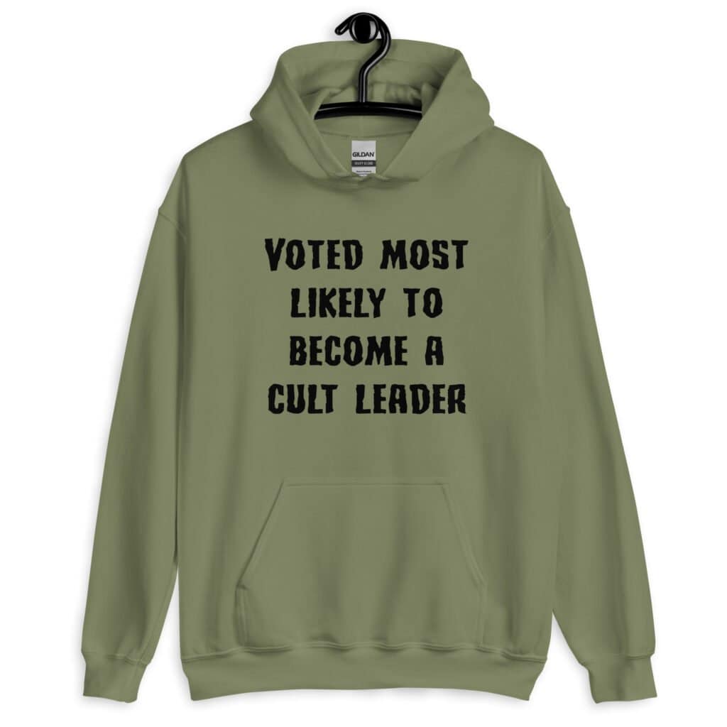 Military green hoodie sweatshirt with the text 'Voted most likely to become a cult leader' printed on the front.